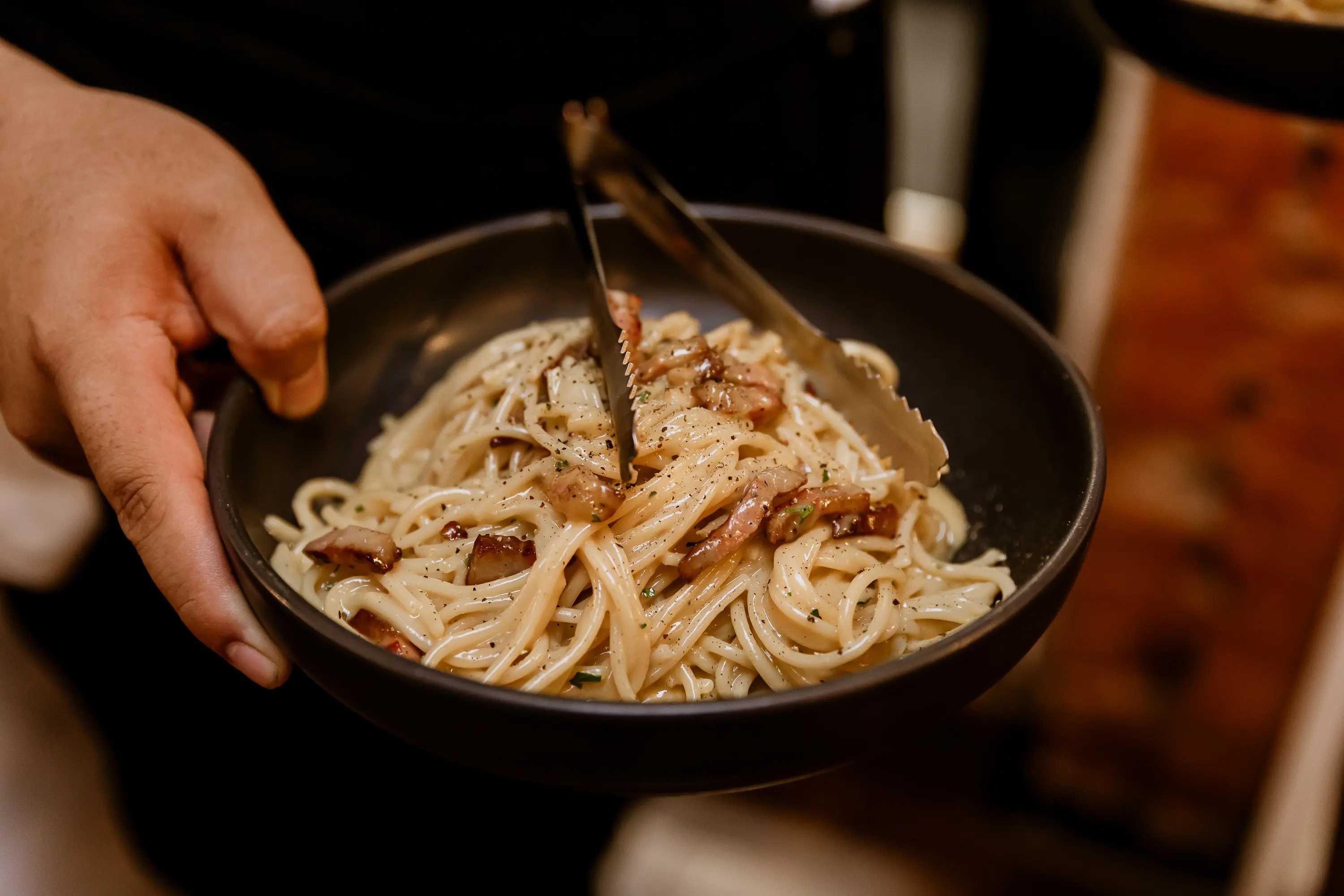 A plate of pasta with a mix of mushrooms.