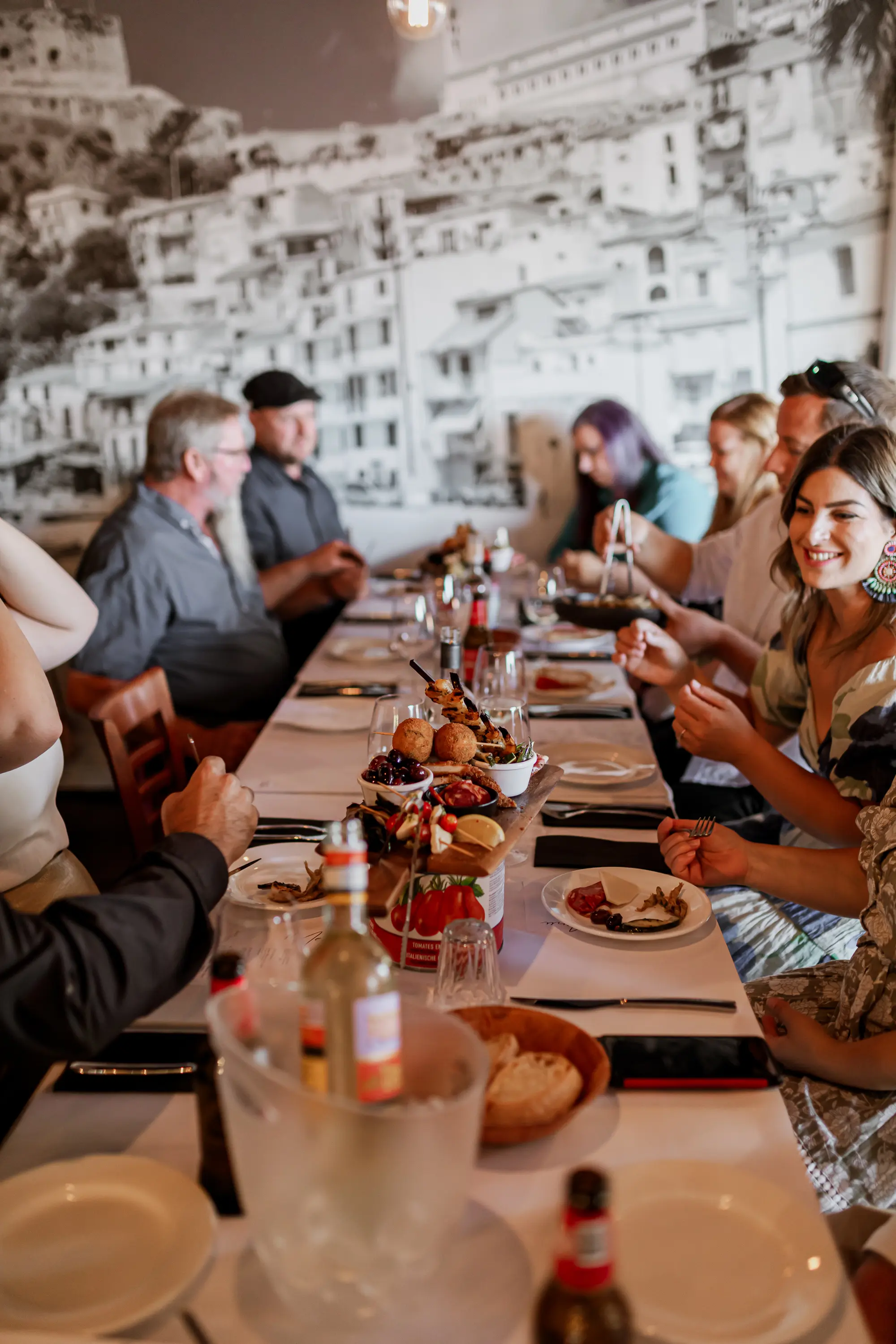 A family eating within the restaurant of Paladino's Cucina.